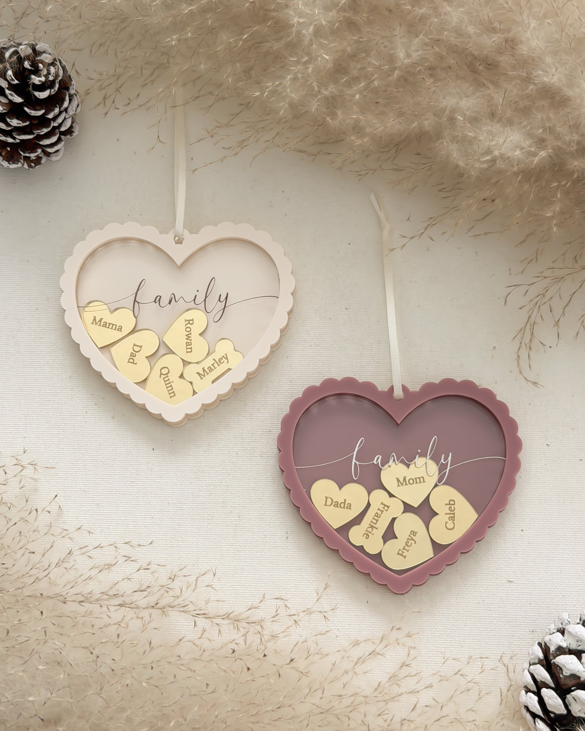 Heart-shaped decorative items with 'family' and heart designs on a textured surface.